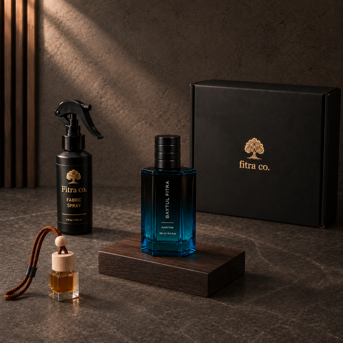 Three-piece Essentials Gift Set with branded gift box on dark stone and walnut.