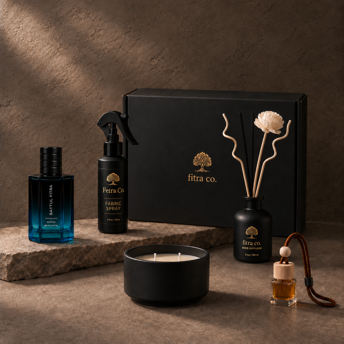 Five-piece Premium Gift Set with branded black gift box on warm natural stone.