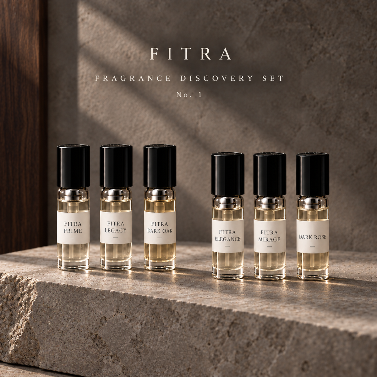 Fitra Discovery Set No. 1: six fragrance samples on limestone with walnut accents.